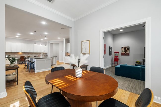 The breakfast room is situated between the kitchen and the game room and is the perfect size for small gatherings. | Image 19