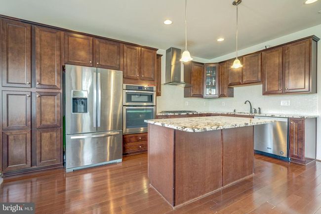 23314 Tradewind Dr, Townhouse with 3 bedrooms, 4 bathrooms and null parking in BRAMBLETON VA | Image 24