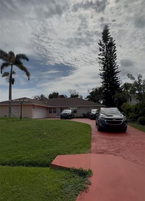 1457 Se Ladner St, Port St Lucie, FL, 34983-3101 | Card Image