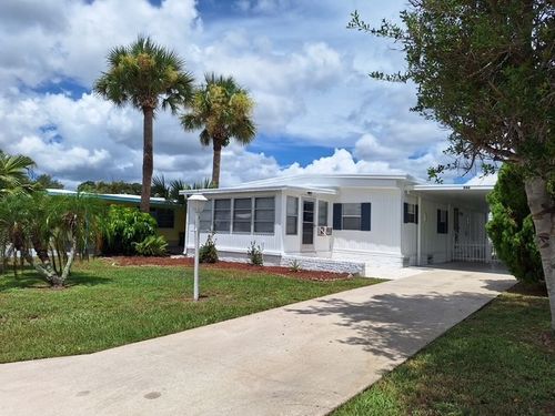 886 Pecan Cir, Barefoot Bay, FL, 32976-7392 | Card Image