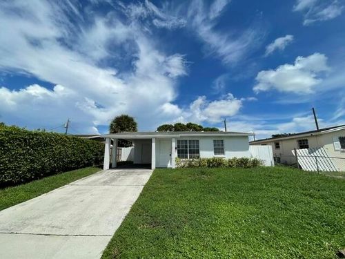 1104 W 24th St, Riviera Beach, FL, 33404-4210 | Card Image