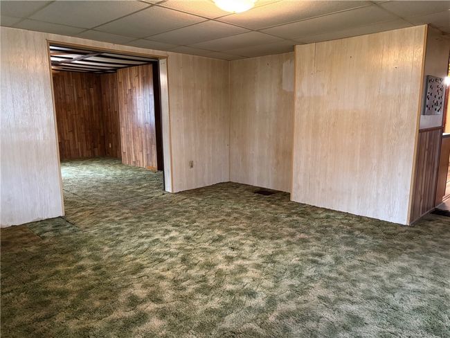 A View into the additional mirrored living room Side by side. | Image 13