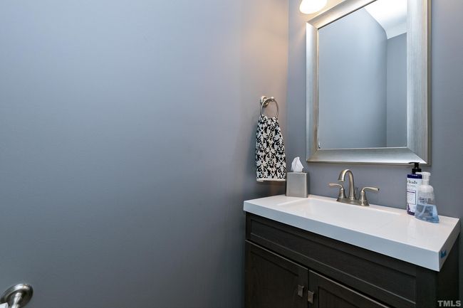 Located near the back door away from the kitchen and dining. | Image 19