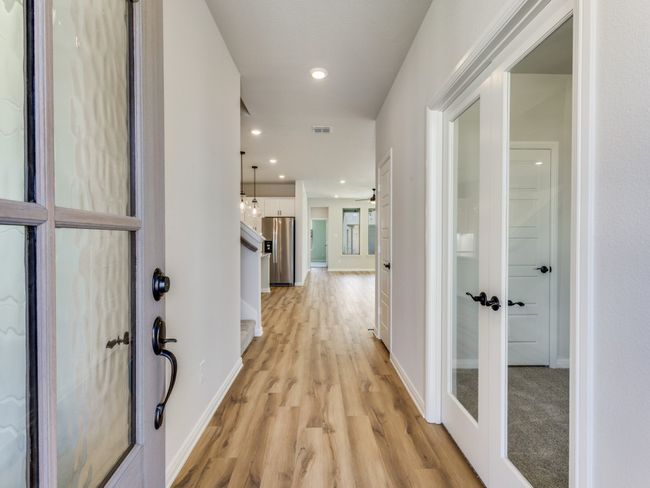 Open the door to your new dream home and enjoy sight lines from the front to the back of the home. | Image 4