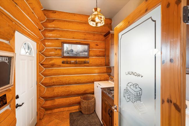 Main level laundry room. | Image 25