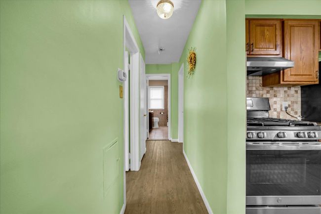 Same flooring throughout the main floor | Image 11