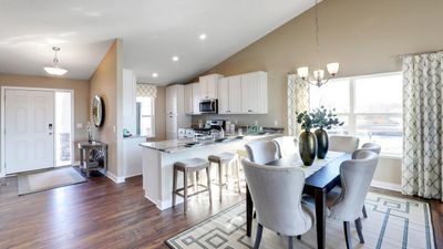 Welcome home to the Rushmore Northern Craftsman at Ravine Crossing in Cottage Grove! Photo is of Model home. Options and colors may vary. Ask Sales Agent for details. | Image 2