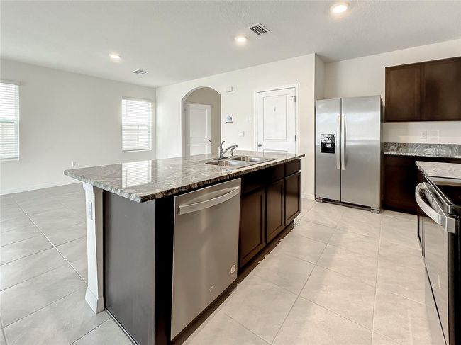 10556 Penny Gale Loop, House other with 5 bedrooms, 4 bathrooms and null parking in SAN ANTONIO FL | Image 16