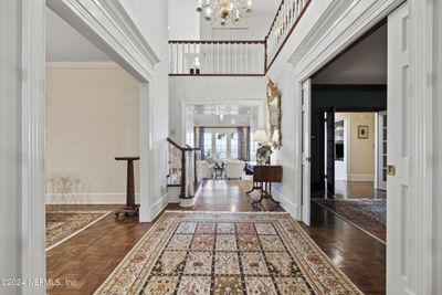 Elegant wide foyer entry leads your eye straight to the riverfront | Image 2