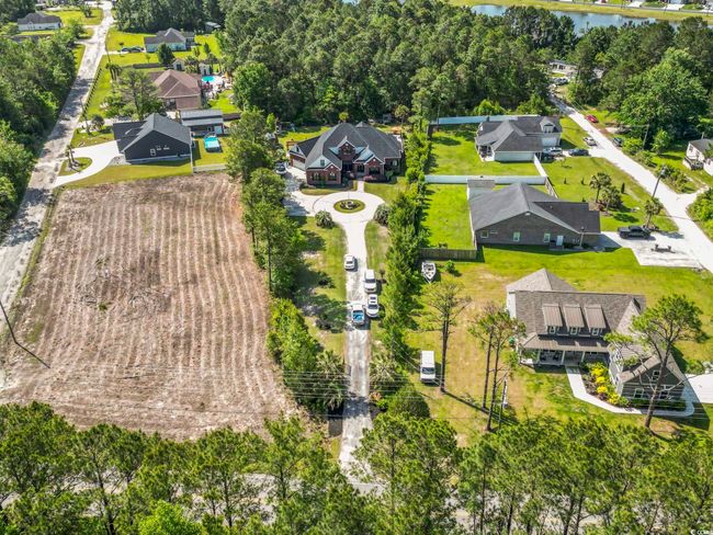 Birds eye view of property featuring a water view and a residential view | Image 38