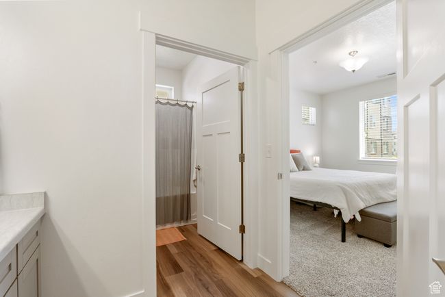 Bedroom featuring light wood finished floors | Image 13