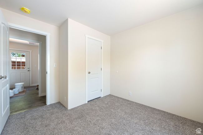 Unfurnished bedroom featuring carpet flooring | Image 16