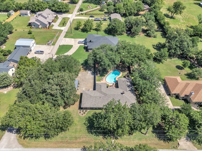 Aerial perspective of suburban area with a pool area | Image 35