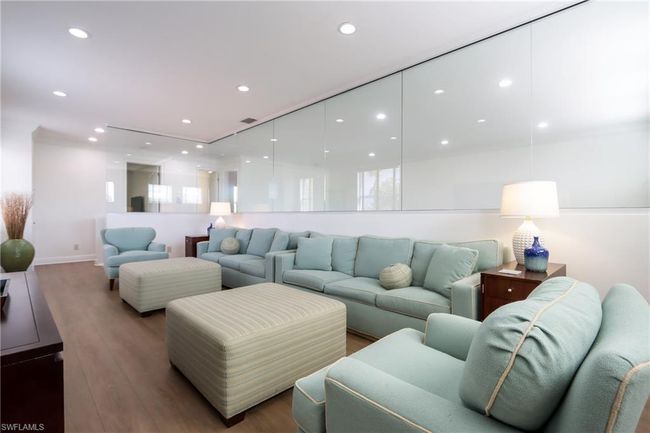 Living area featuring wood finished floors and recessed lighting | Image 15