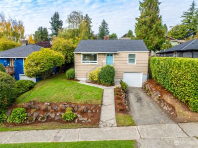 Welcome Home. Fantastic location in the heart of Genesee Hill. Sitting up high on a street to street lot. | Image 1