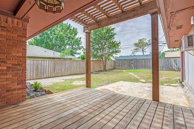 Deck featuring a pergola and a patio | Image 36