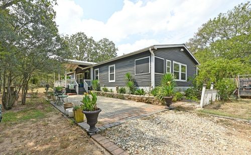 112 Spring Creek Cv, Cedar Creek, TX, 78612-4891 | Card Image