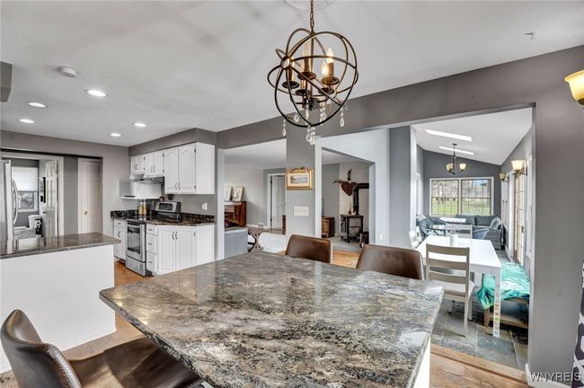 Open concept kitchen, dining and living area perfect for entertaining | Image 12