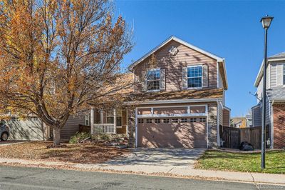 9673 Sun Meadow Street, House other with 4 bedrooms, 2 bathrooms and 2 parking in Highlands Ranch CO | Image 2