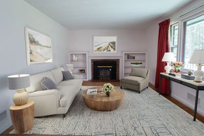 Cozy living room with picture window | Image 1