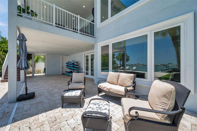 The pool deck has ample room for seating - either under the shade of the lanai, or full sun. | Image 92