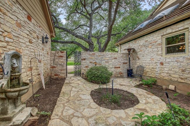 Adorable courtyard between garage and home | Image 34