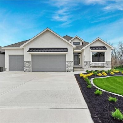 View of front of home with a garage | Image 1