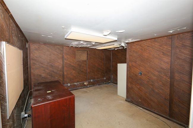 Basement with wooden walls | Image 19