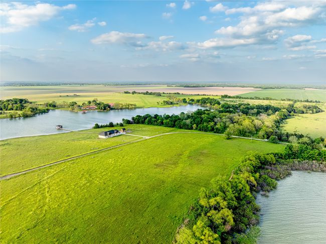 Bird's eye view with a rural view and a water view | Image 12