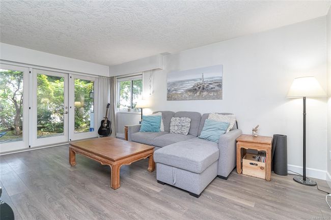 Large living space with private patio | Image 5