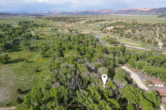 Aerial view of property and surrounding area with a mountainous background | Image 60