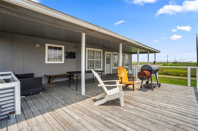 Upstairs patio and balcony are a great space for family to spend time hanging out. | Image 15