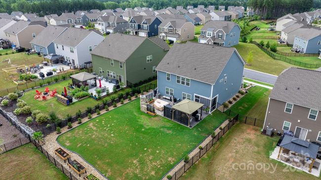Drone view of back of property. | Image 43