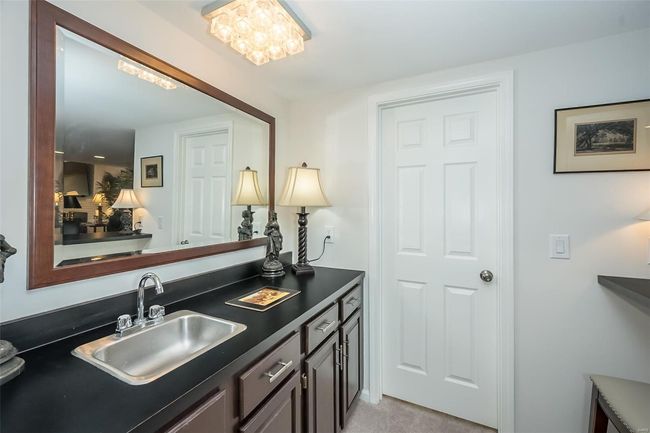 Lower Level Family Room that walks out to the patio. | Image 55