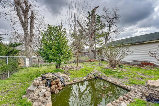 View of yard featuring a fenced backyard | Image 23