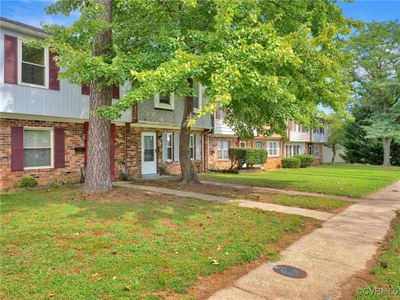 Multi unit property with a front yard | Image 2