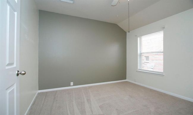 2nd bedroom. All bedrooms with recent carpet, vaulted ceilings, ceiling fans and large closets. | Image 22