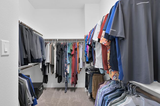 Enormous walk-in closet. Large enough for all your clothes and shoe collections. | Image 16