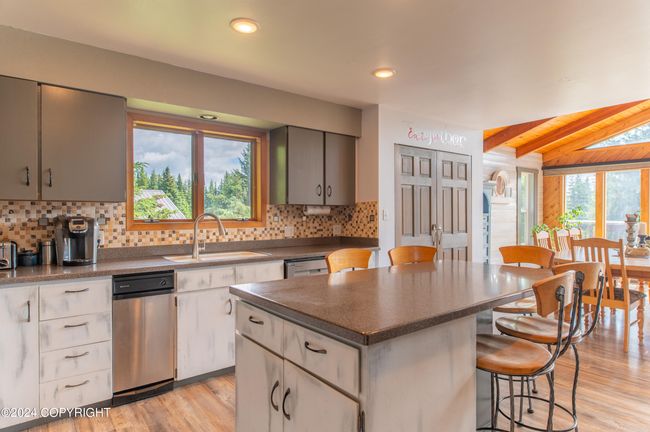 Stairway opens to kitchen | Image 25
