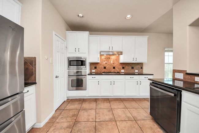 14311 Lakepointe Bend Ln, House other with 6 bedrooms, 4 bathrooms and 2 parking in Cypress TX | Image 20