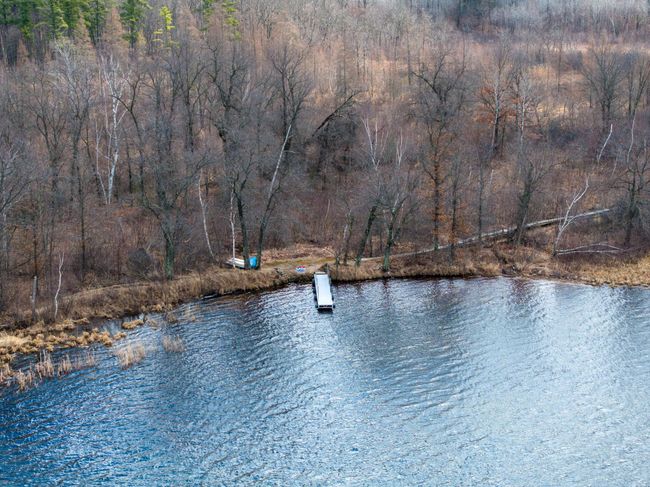 Aerial view of the beach and dock area. | Image 88