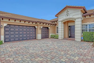 104 Manor Circle, House other with 4 bedrooms, 3 bathrooms and null parking in Jupiter FL | Image 2