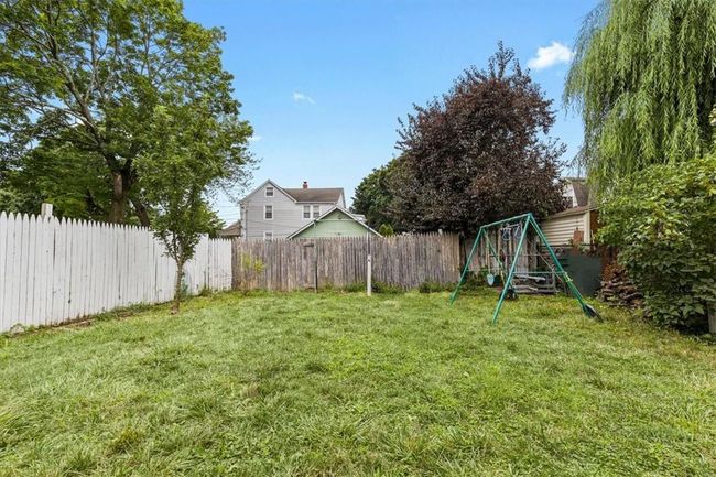 View of yard with a playground | Image 22