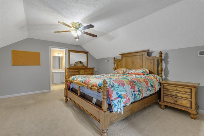 Another view of the upper bedroom. From here you can see the full bath and just how truly large this room is. | Image 16