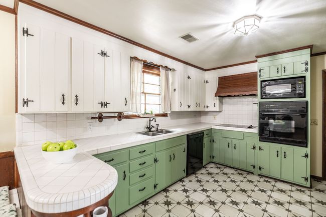 Moving into the kitchen you'll find a great mix of old and new. | Image 23