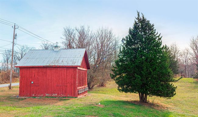 Side view of barn featuring a yard | Image 24