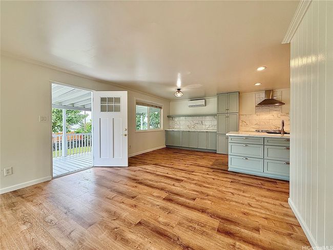 dining leads seamlessly to the covered lanai | Image 13