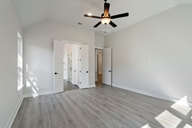 Primary Bedroom with elevated ceiling | Image 18