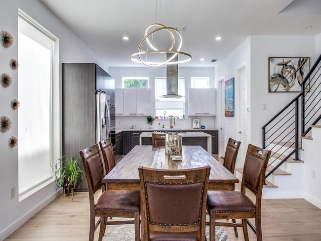 Dining area featuring stairway, light wood-style flooring, and recessed lighting | Image 9