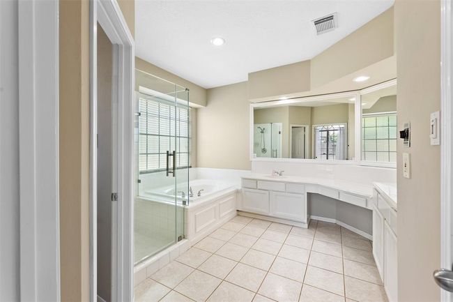 Primary Bathroom with jetted tub and separate shower with closet | Image 8